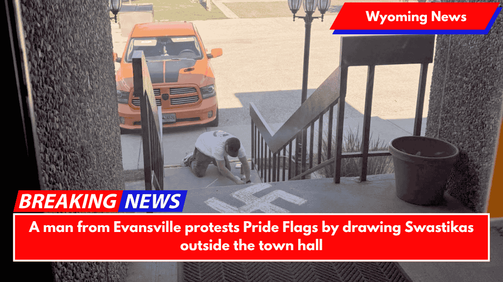 A man from Evansville protests Pride Flags by drawing Swastikas outside the town hall